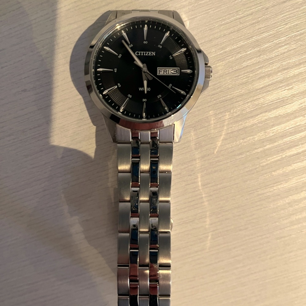 Citizen watch barely worn, needs battery, face is more blue than appears